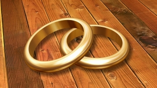 Two Wedding Rings on a Table Loop - Video HD